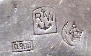 Клеймо на серебряных часах компании Rodi & Wienerberger. Проба 900
